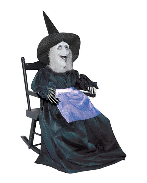Animatronic figure of a witch sitting